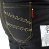 Arborist Wearing Clogger Denim Chainsaw Pants While Climbing